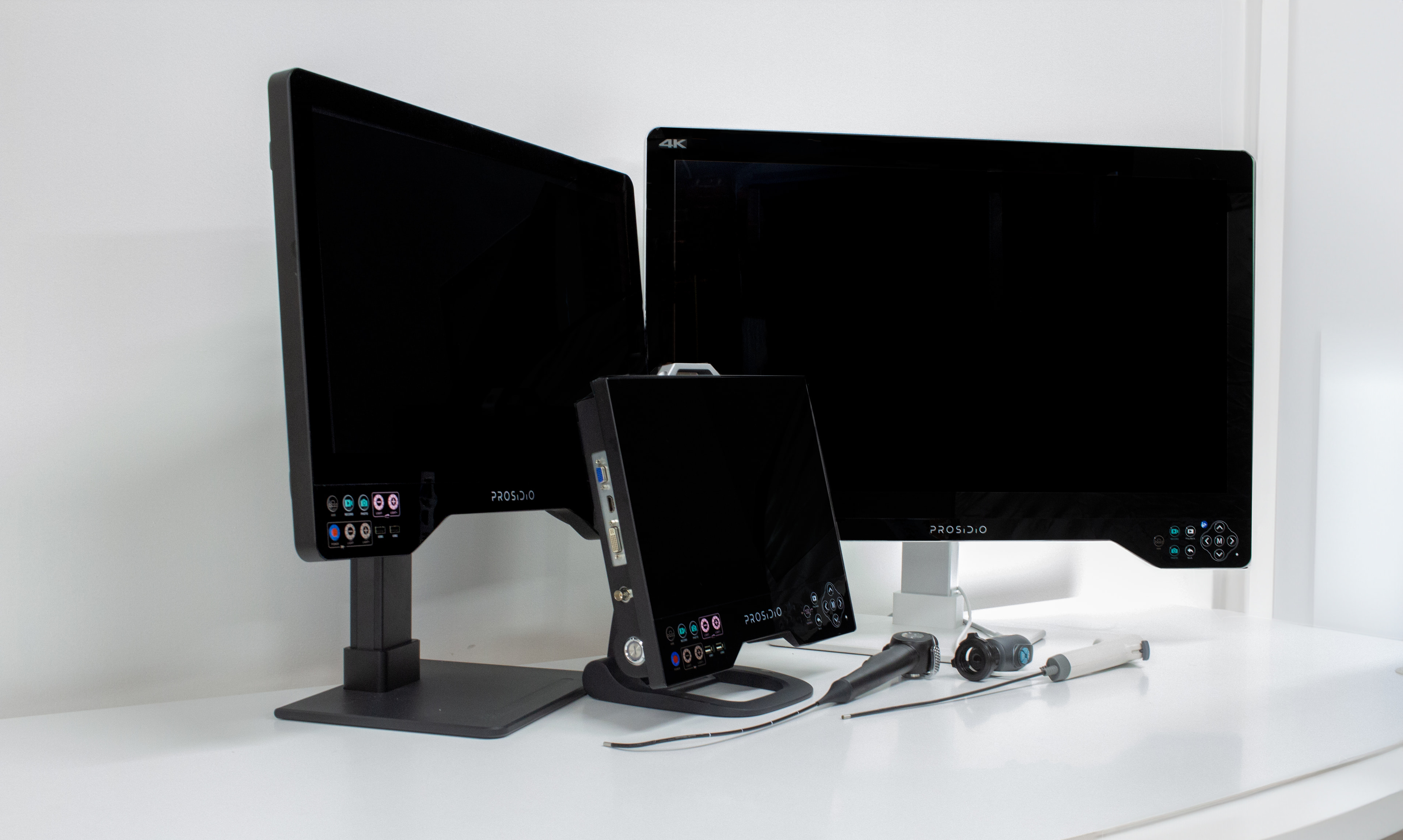 Three Prosidio L.S. Series endoscopy displays with camera heads and rigid endoscopes