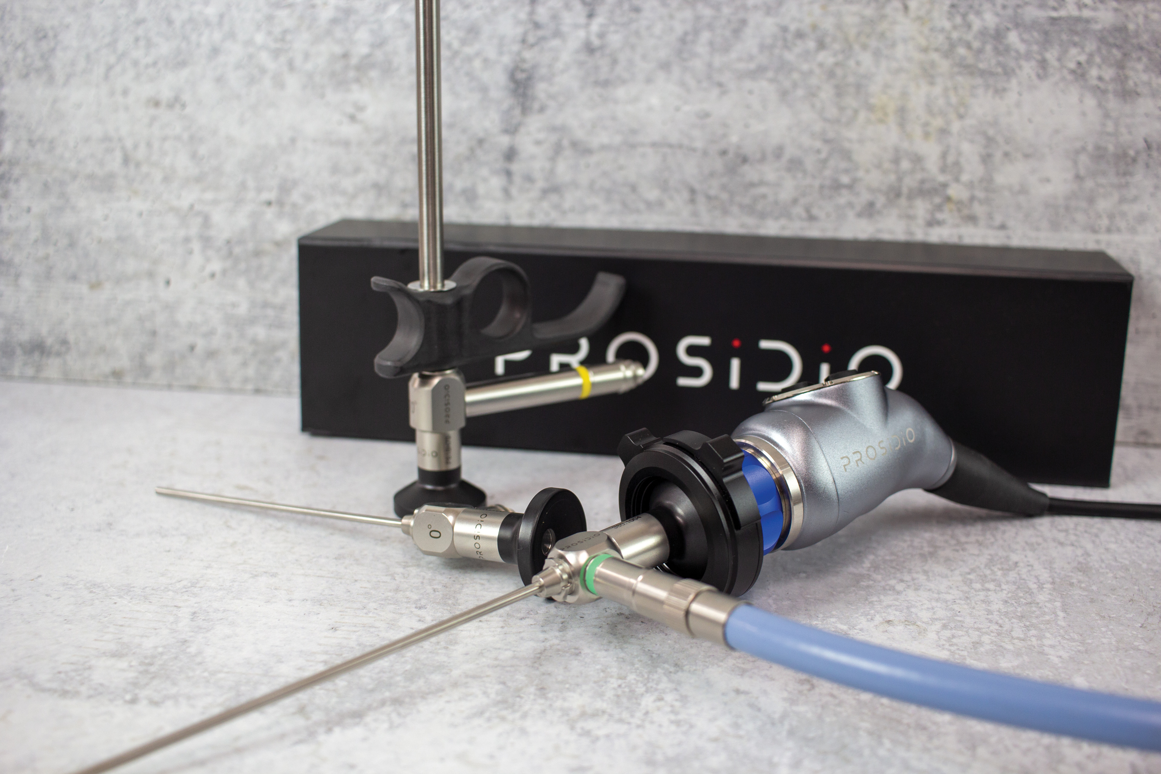 Rigid endoscopes and a camera head arranged beside a Prosidio display